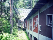  former eni village of borca di cadore_holiday camp building and the woods - photo by alice ferrazza